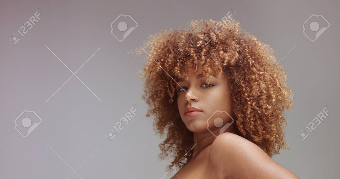 Mixed Race Black Woman With Neutral Makeup Portrait Curly Hair
