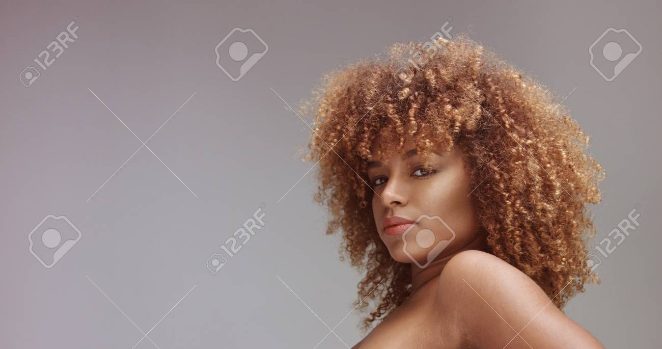 Mixed Race Black Woman With Neutral Makeup Portrait Curly Hair