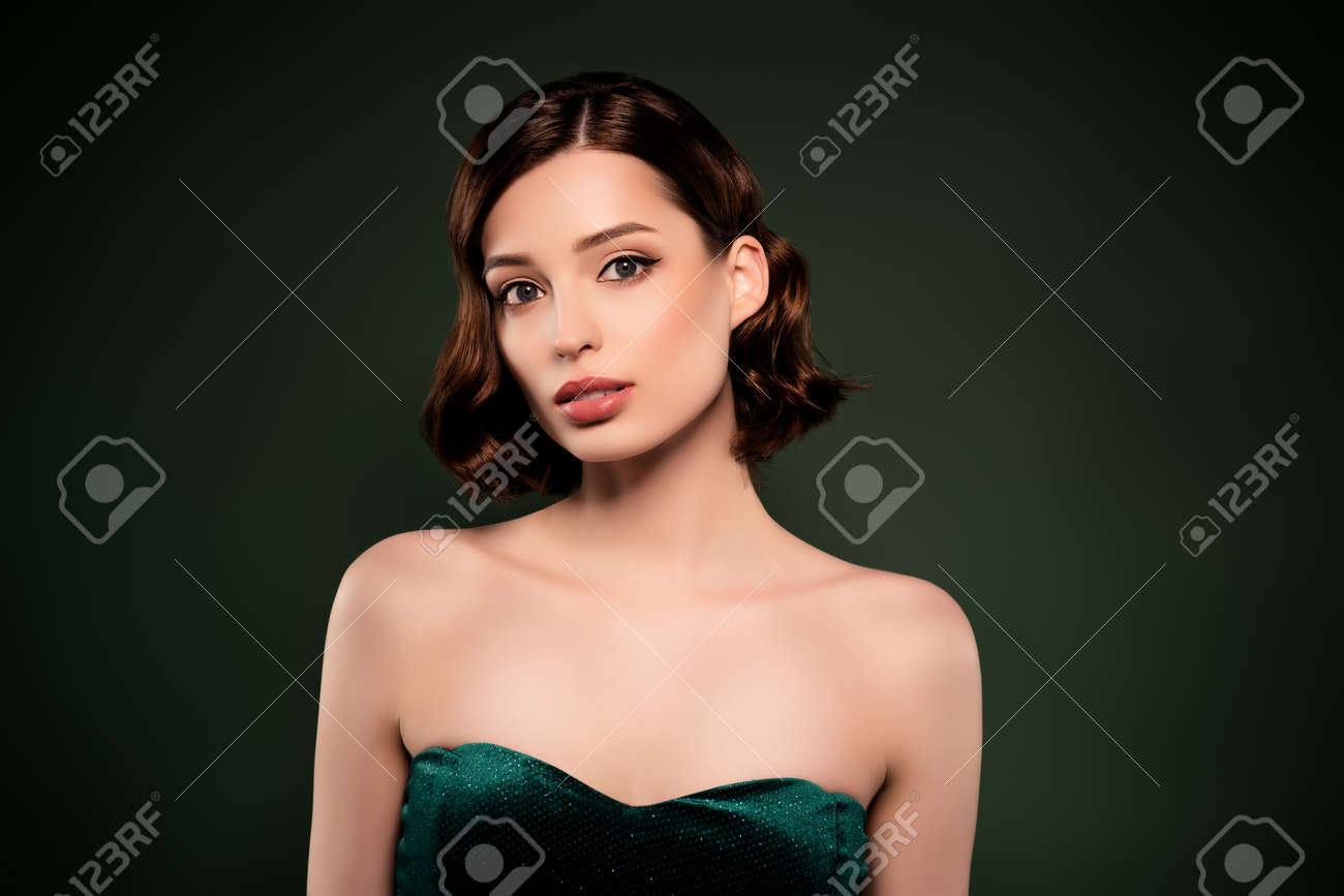 Portrait Of Gorgeous Stunning Young Female With Naked Shoulders Wear Top  Pure Innocent Isolated Green Color Background Stock Photo, Picture and  Royalty Free Image. Image 178436770.