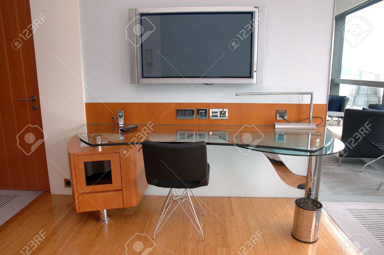 work desk with plasma tv in a modern hotel room stock photo work desk with plasma tv in a modern hotel room stock photo