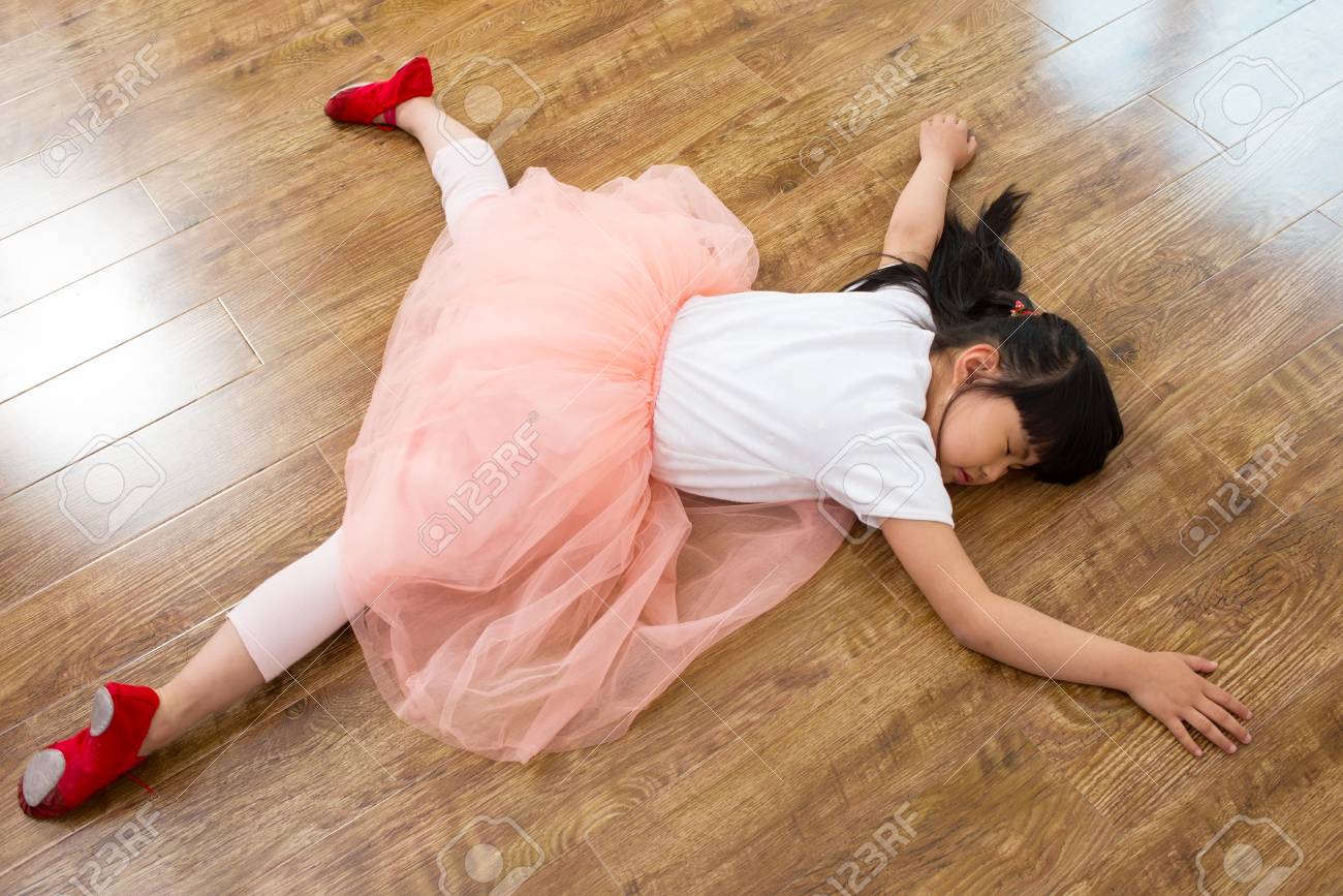 Wear Shoes Little Girl Sleeping On The Wooden Floor Stock Photo