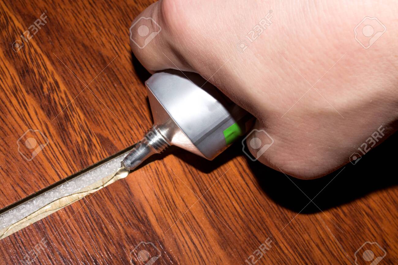 Gluing The Joints Of The Laminate Stock Photo Picture And