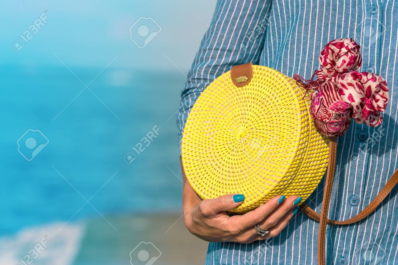 yellow rattan bag