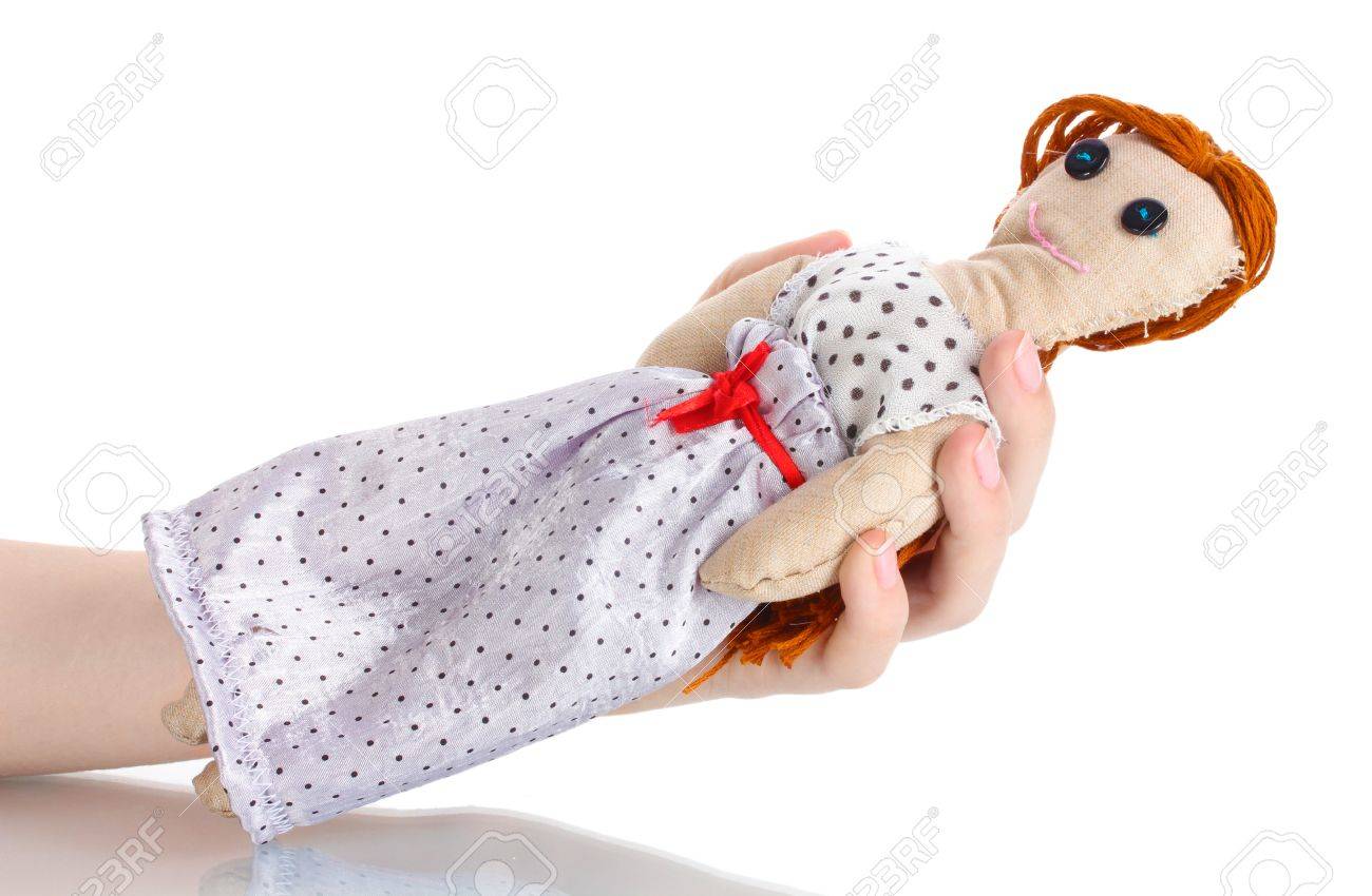 白で隔離の女性の手でブードゥー教の人形女の子 の写真素材 画像素材