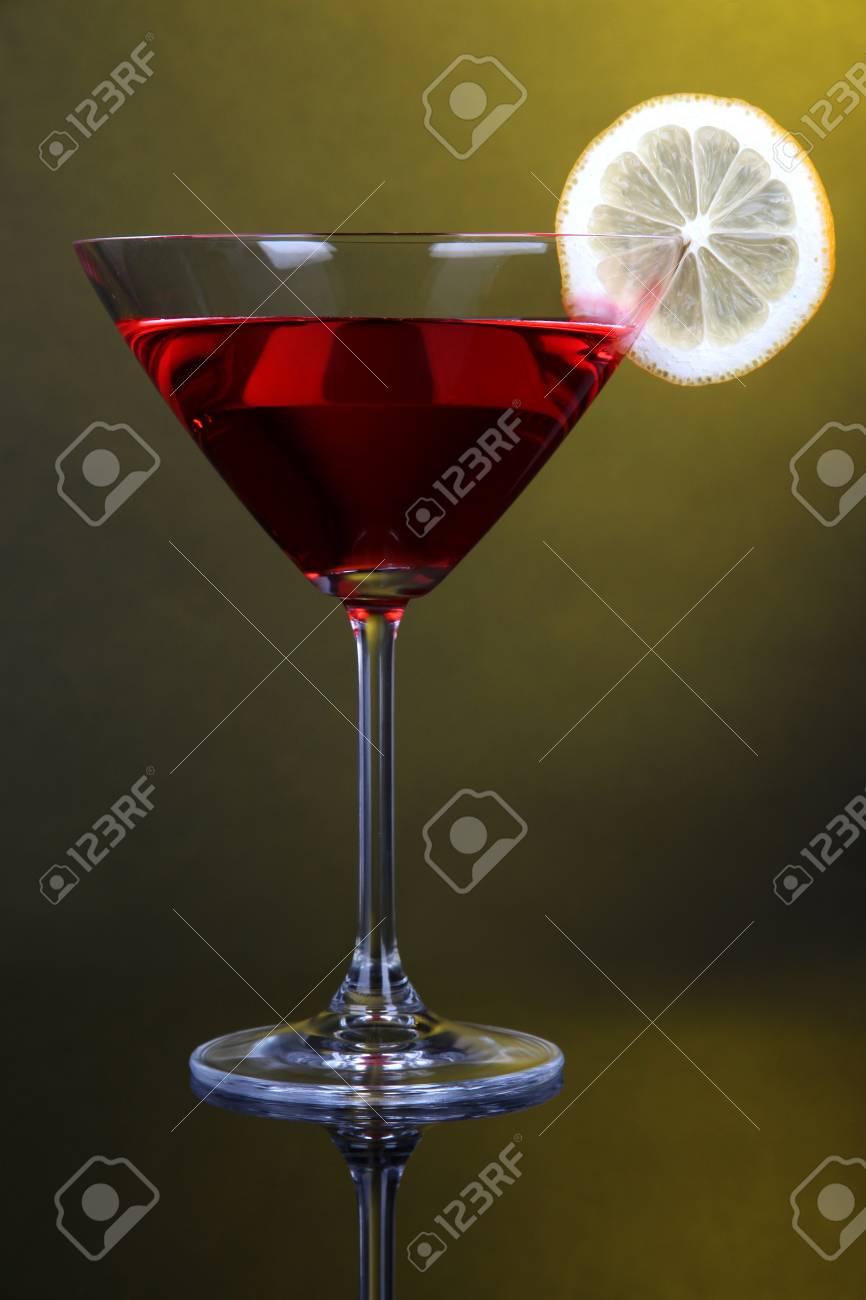 Download Red Cocktail In Martini Glass On Dark Yellow Background Stock Photo Picture And Royalty Free Image Image 19124267 Yellowimages Mockups