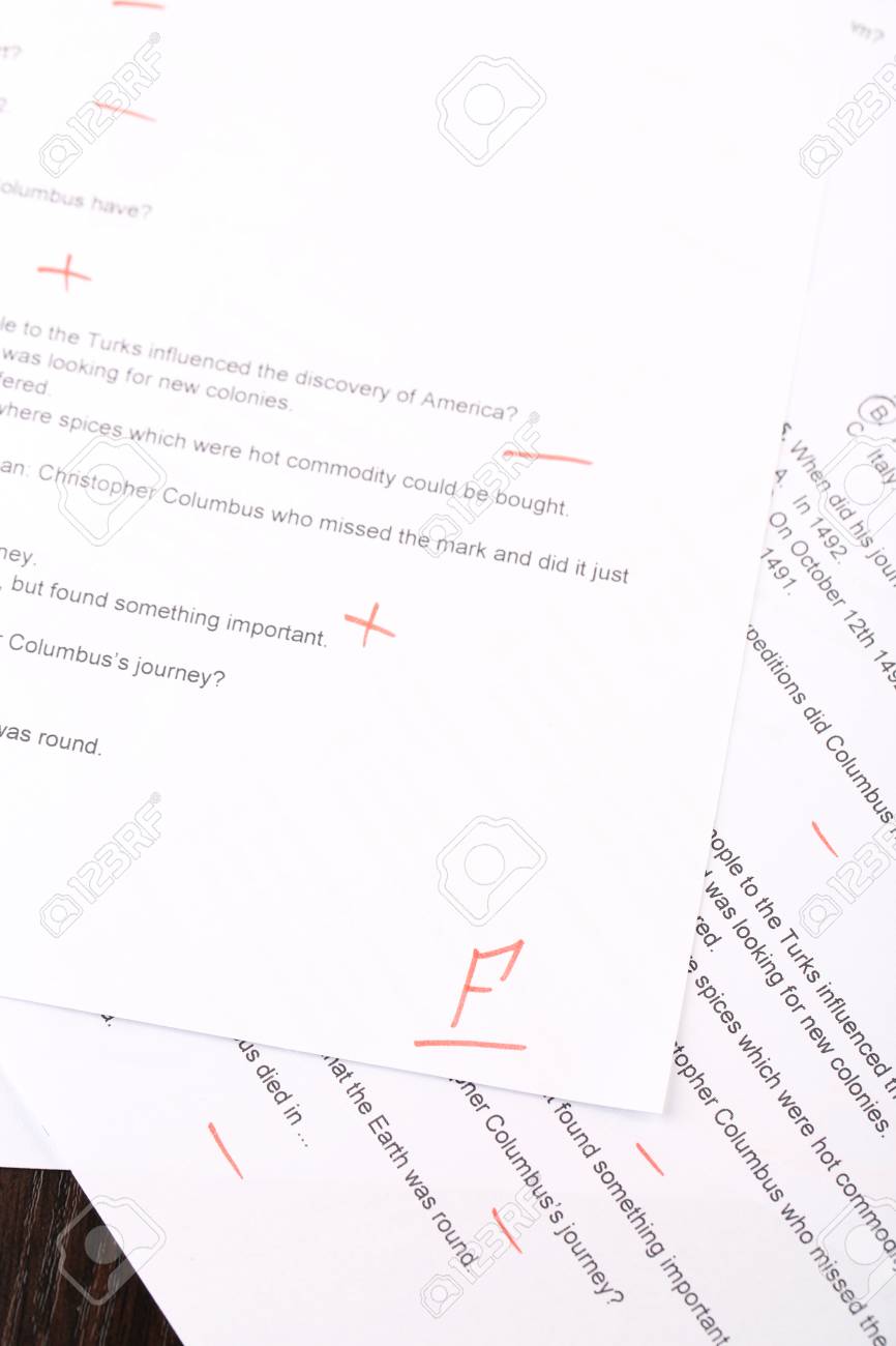 close-up paper, exam Grade written an on