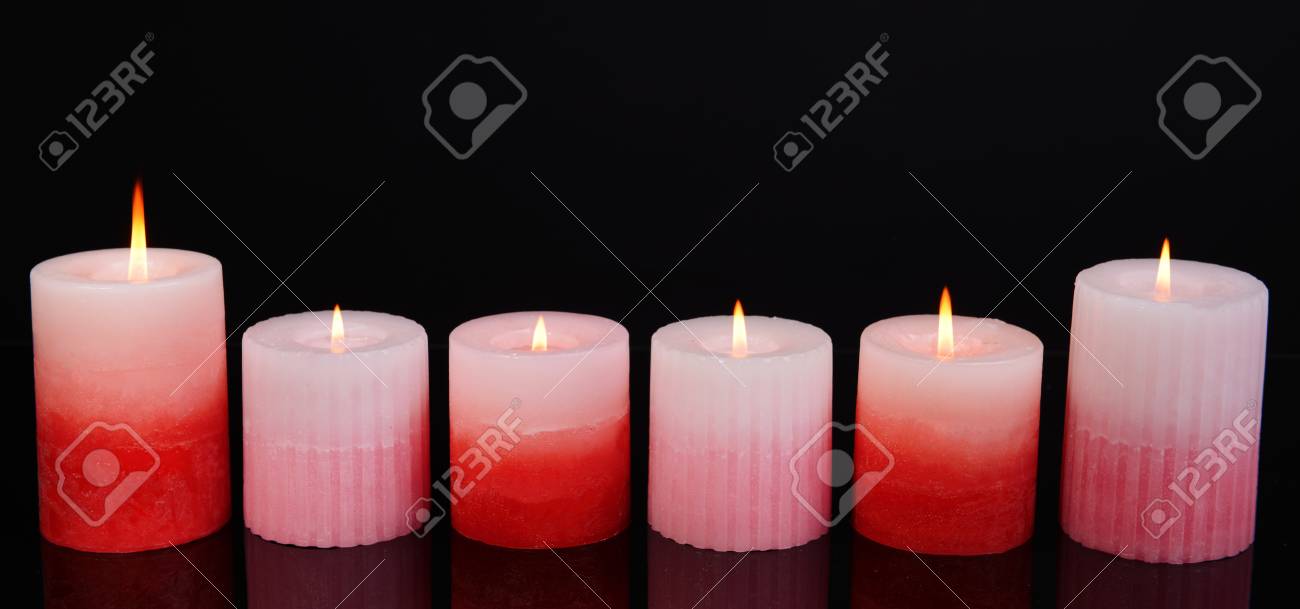 Beautiful Candles Isolated On Black Stock Photo Picture And Beautiful Candles Isolated On Black Stock Photo Picture And