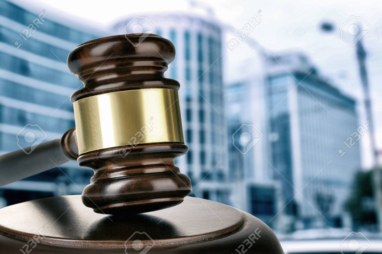 Gavel on building background. Auction concept - 55697586 Gavel on building background. Auction concept - 55697586