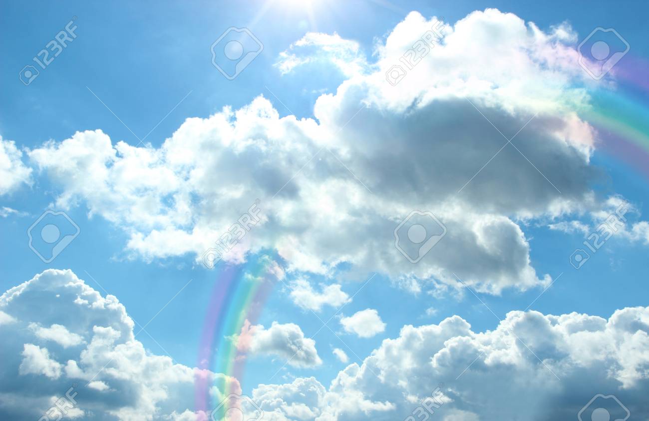 Beautiful View Of Clouds And Rainbow In The Sky Stock Photo Picture And Royalty Free Image Image
