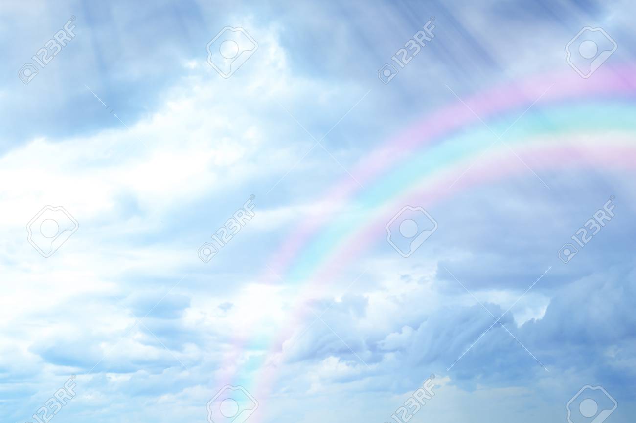 Beautiful View Of Clouds And Rainbow In The Sky Stock Photo Picture And Royalty Free Image Image