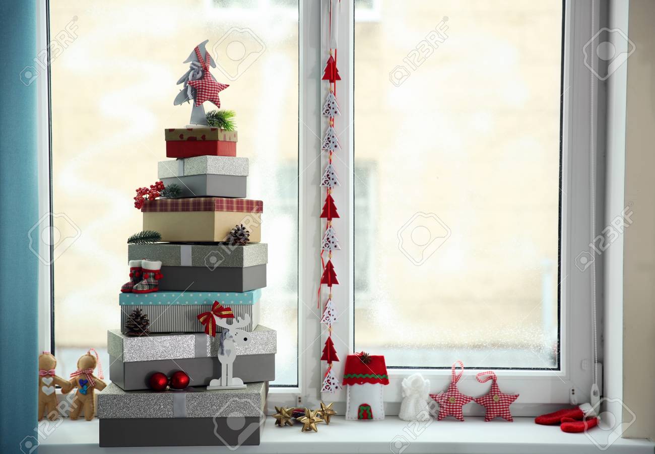 Christmas Tree Made Of Present Boxes And Other Decor On Windowsill