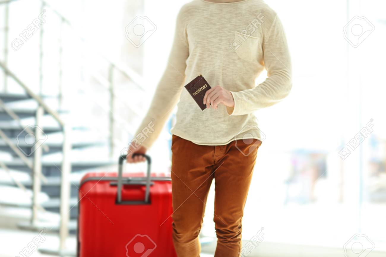 man carrying luggage