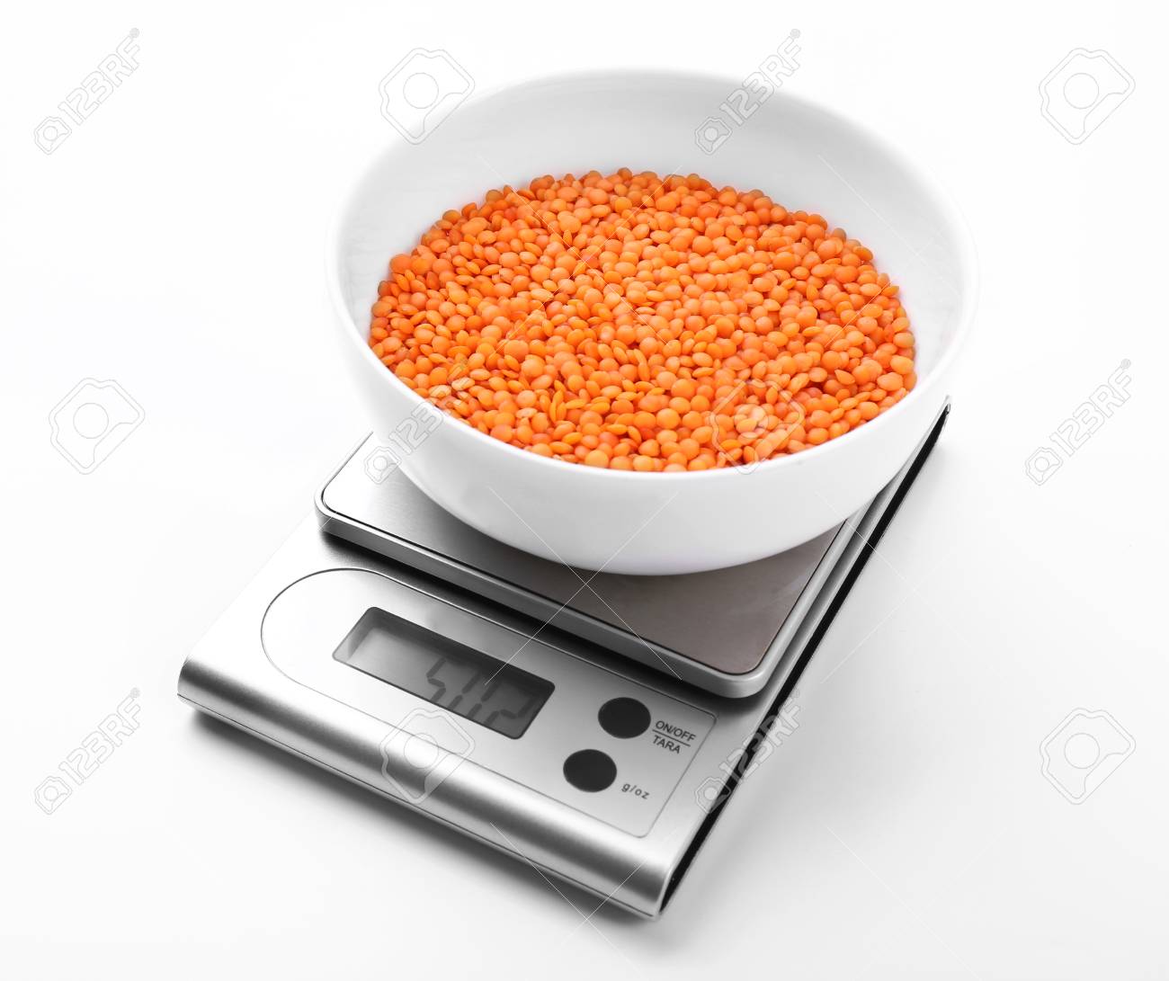 Bowl With Red Lentil On Digital Kitchen Scales Isolated On White Stock Photo Picture And Royalty Free Image Image 95750992