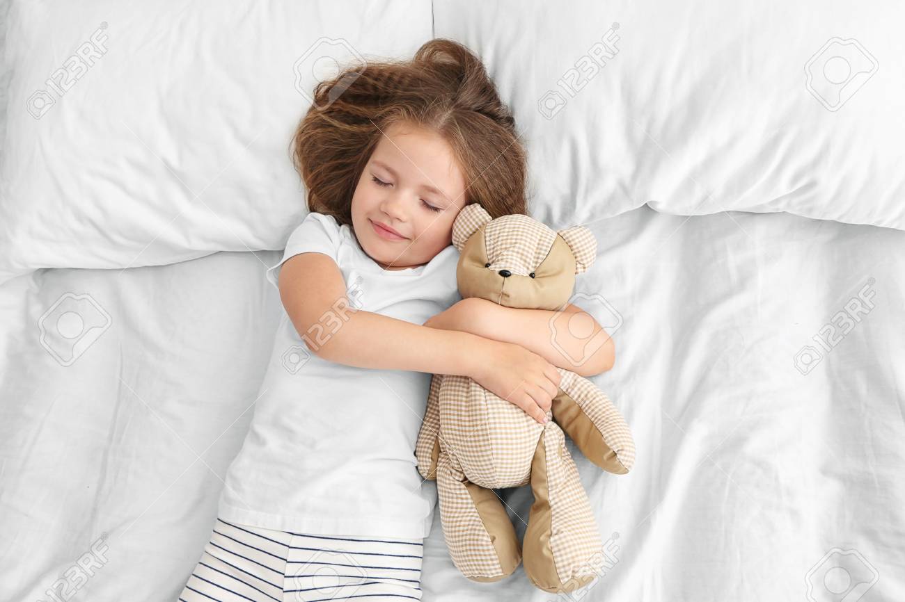 cute little girl with teddy bear
