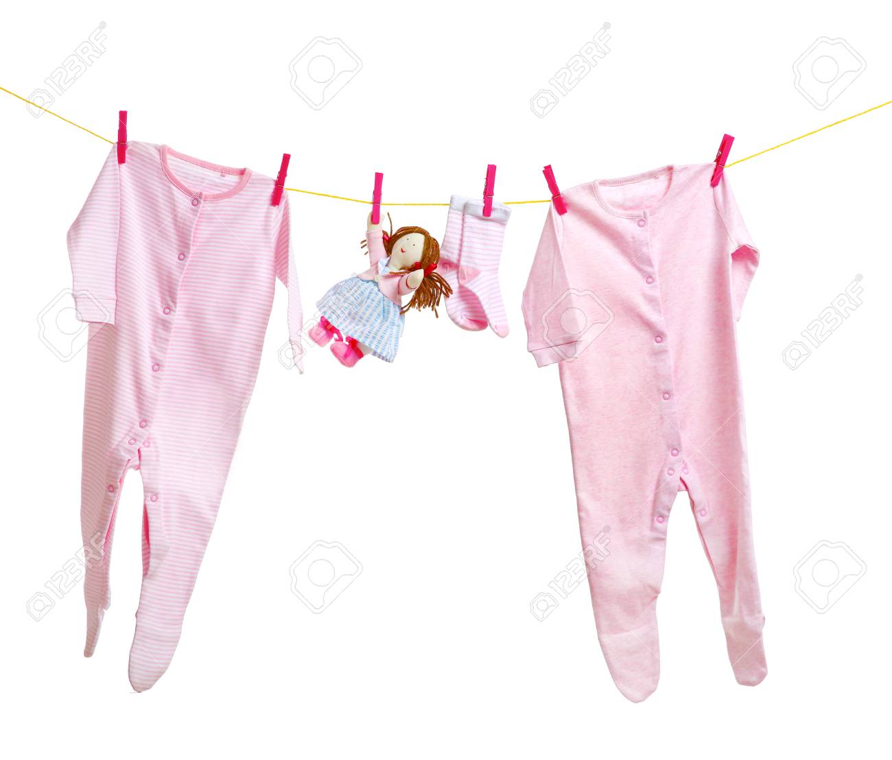 baby clothes hanging on white background stock photo picture and