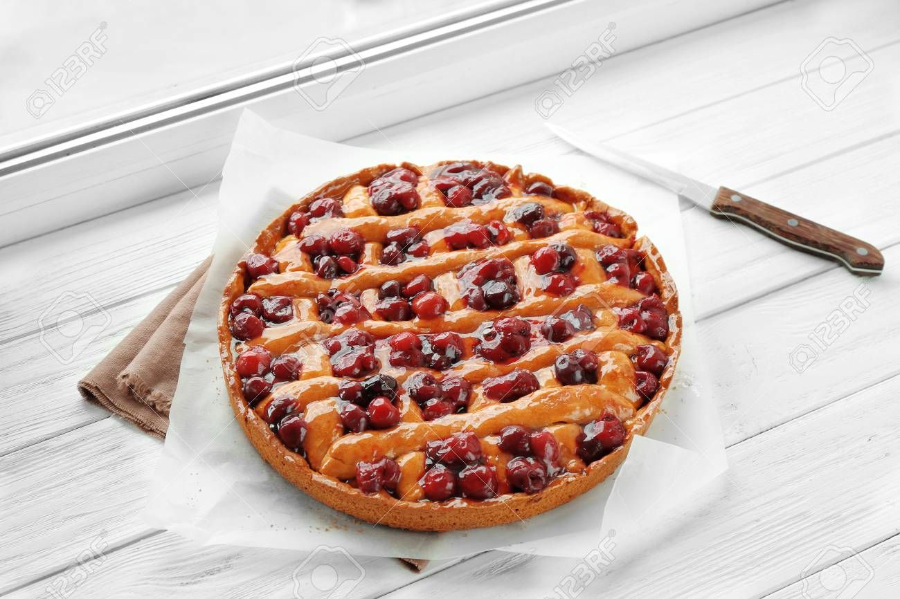Delicious Cherry Pie On Windowsill Stock Photo Picture And