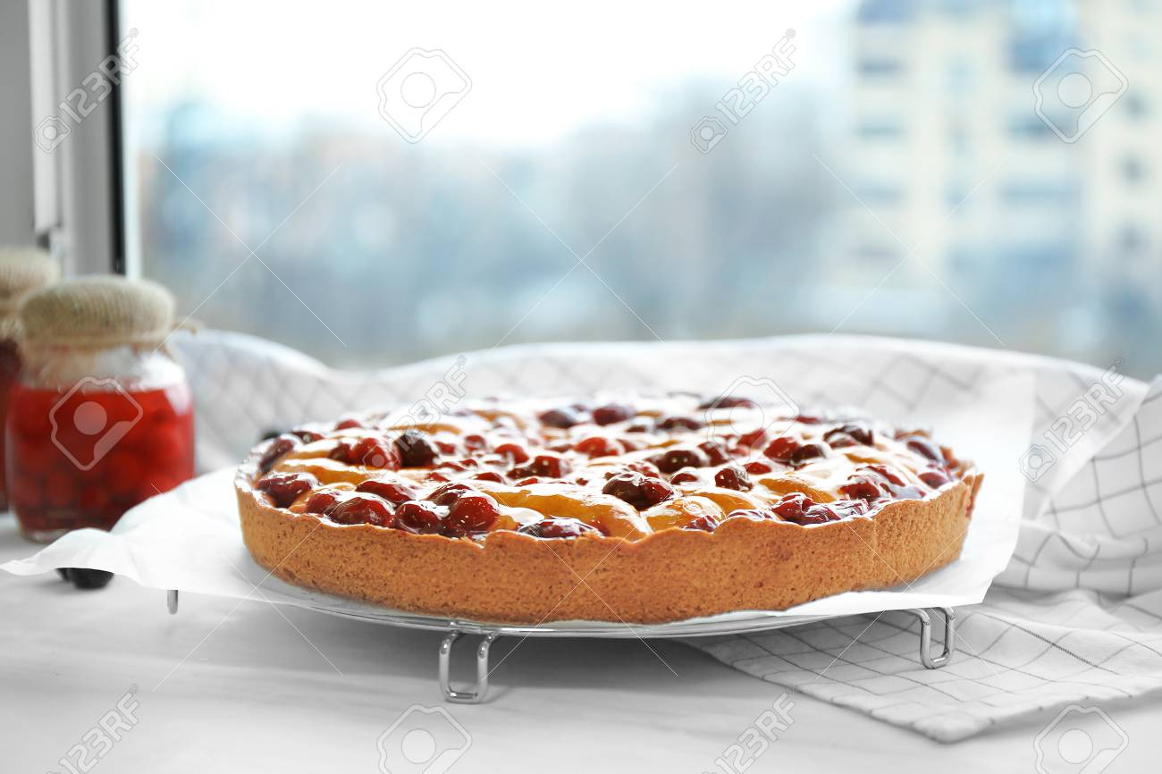 Delicious Cherry Pie On Windowsill Stock Photo Picture And