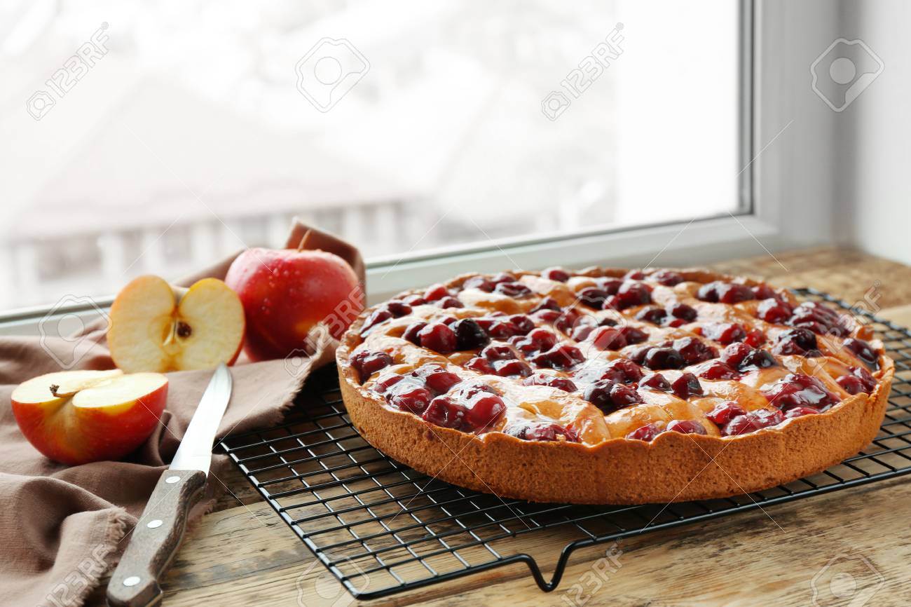Delicious Cherry Pie On Windowsill Stock Photo Picture And