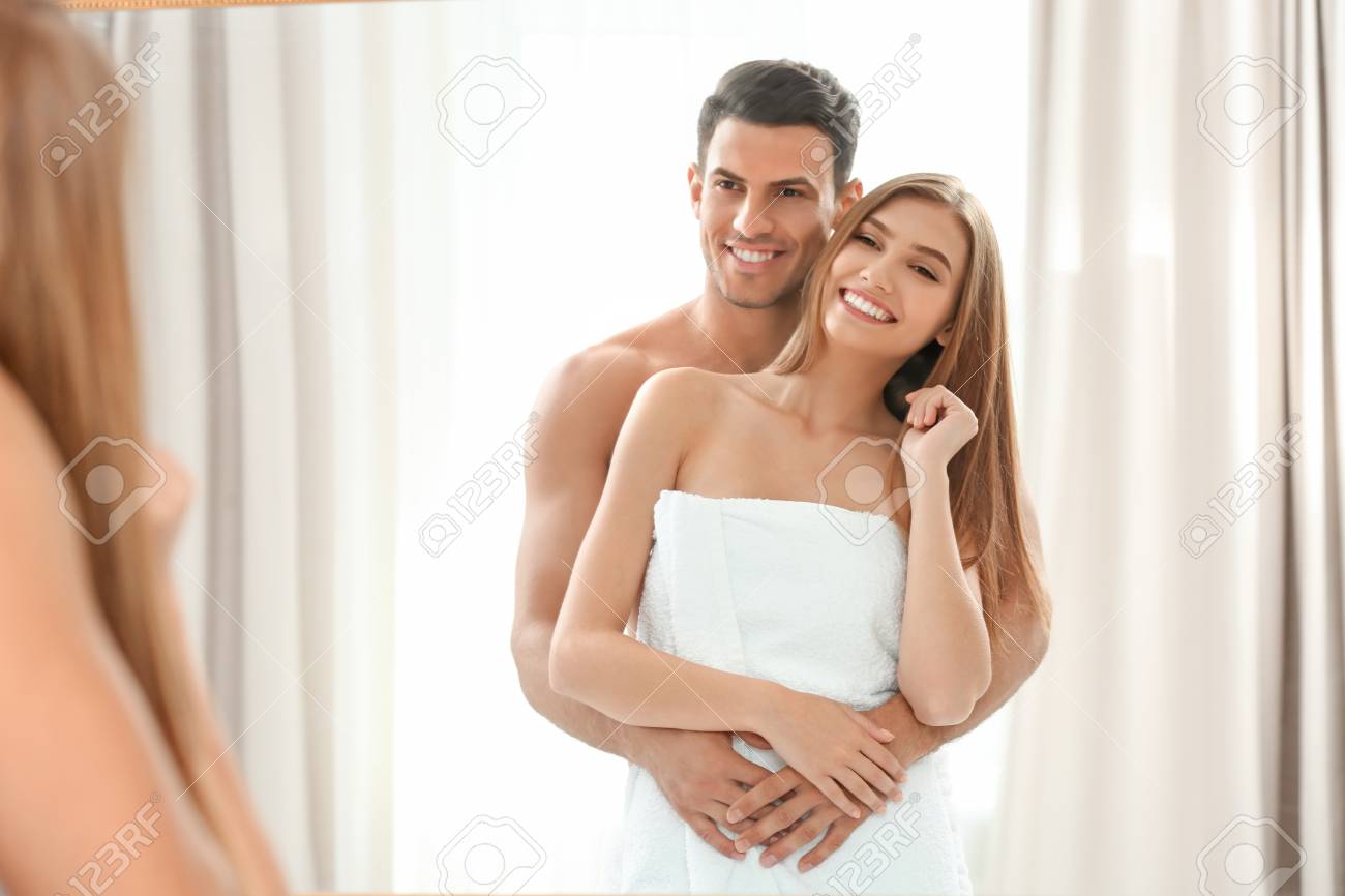 looking in mirror man looking stock photo young loving couple looking in mirror at hotel room loving couple looking in mirror at hotel room looking in mirror man looking stock photo young loving couple looking in mirror at hotel room loving couple looking in mirror at hotel room