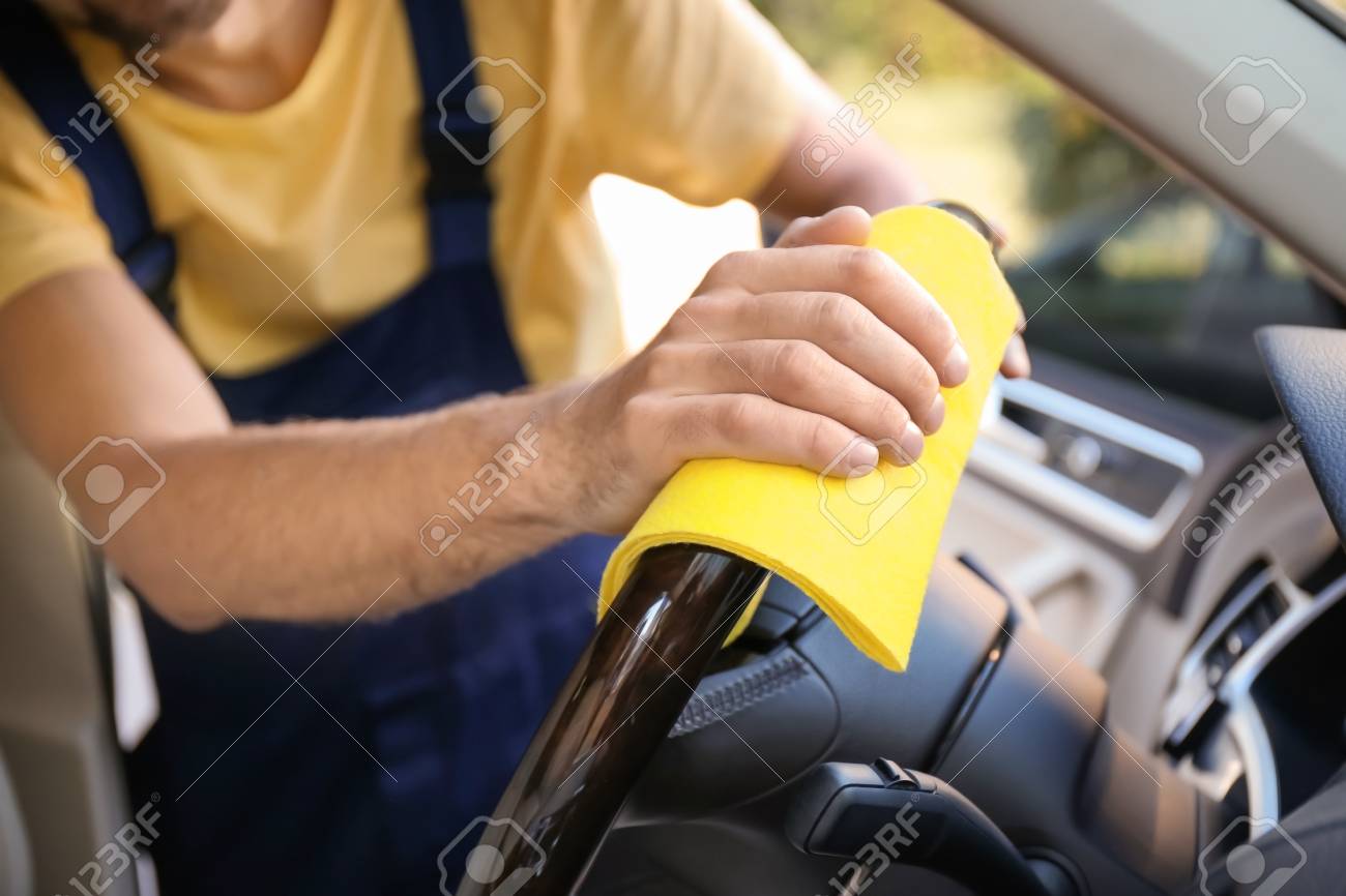 Steering Wheel Cleaner >> Man Cleaning Car Steering Wheel With Rag Closeup Steering Wheel Cleaner >> Man Cleaning Car Steering Wheel With Rag Closeup
