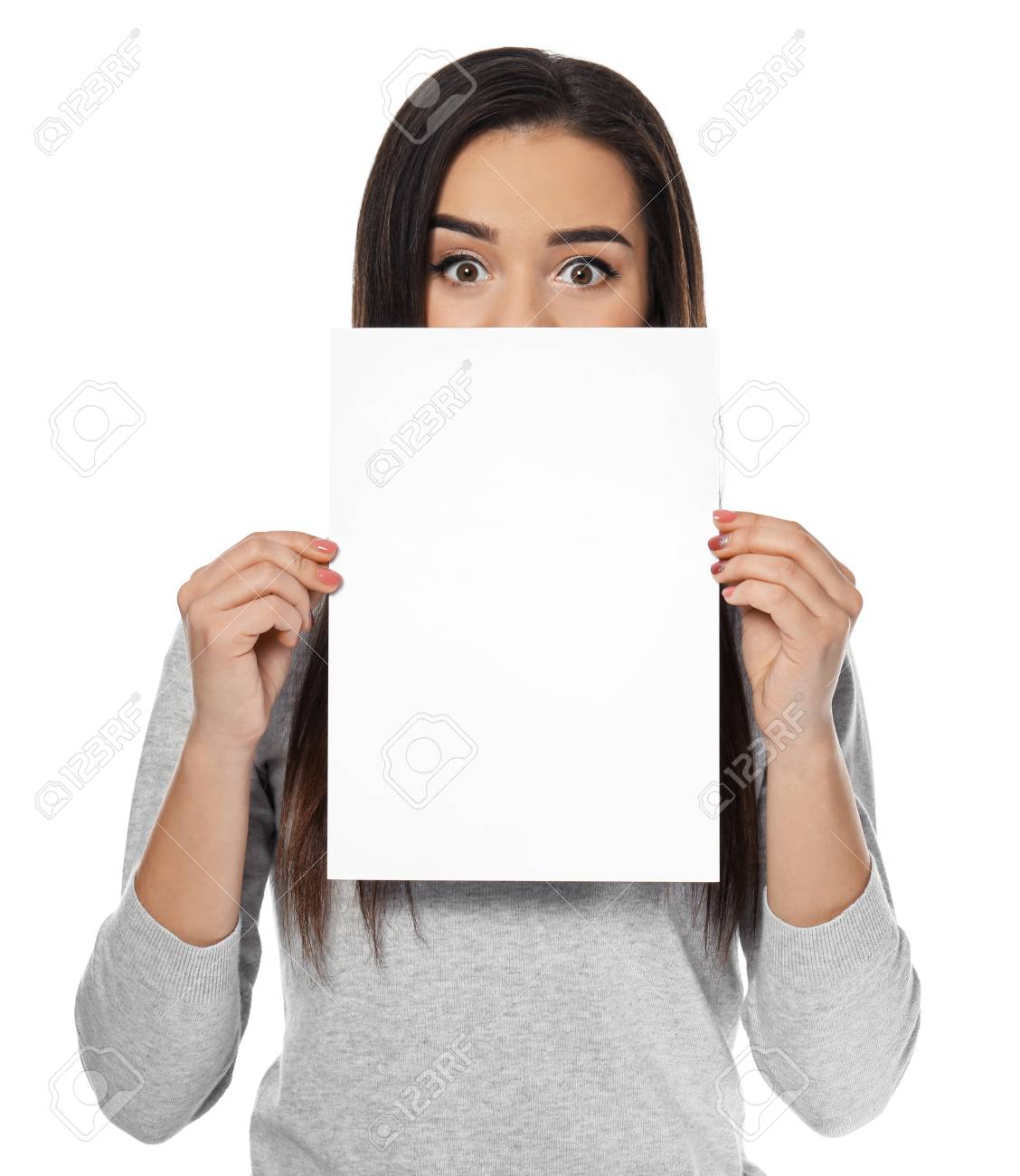 young woman with blank sheet of paper for advertising on white