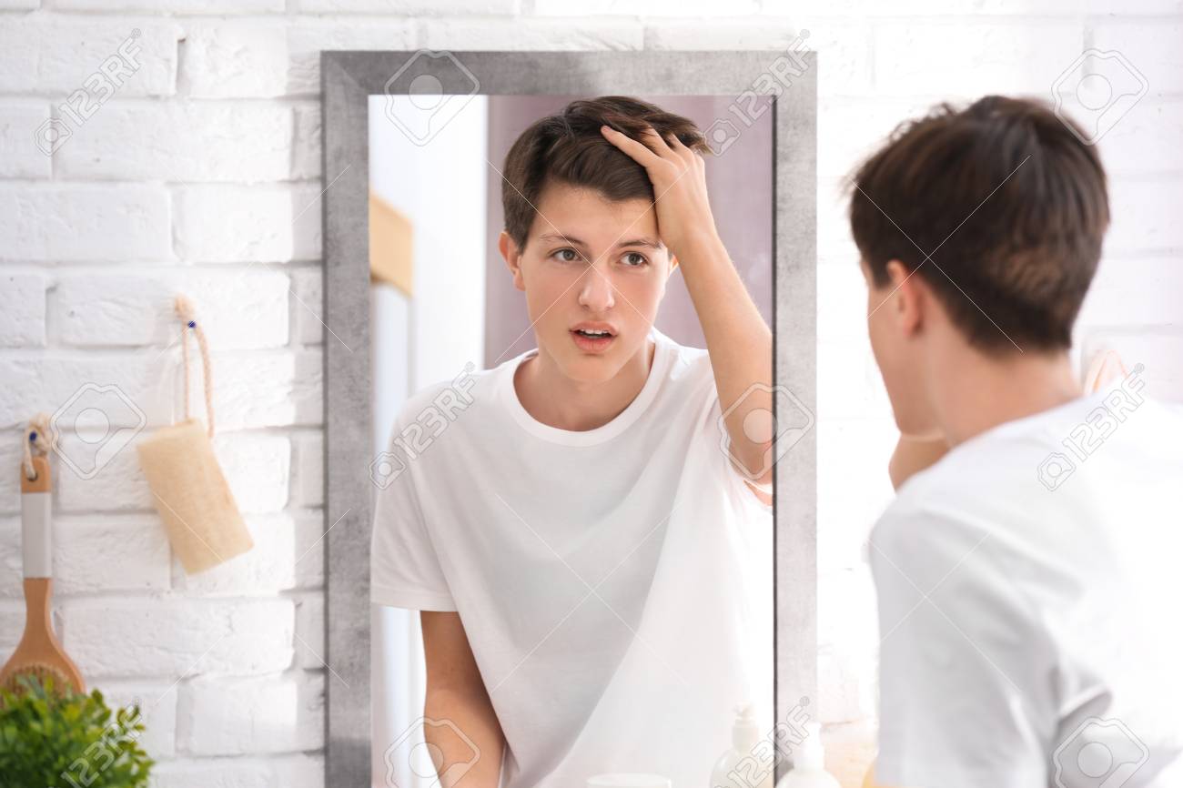 looking in mirror boy stock photo teenage boy with acne problem looking in mirror at home boy with acne problem looking in mirror at home looking in mirror boy stock photo teenage boy with acne problem looking in mirror at home boy with acne problem looking in mirror at home