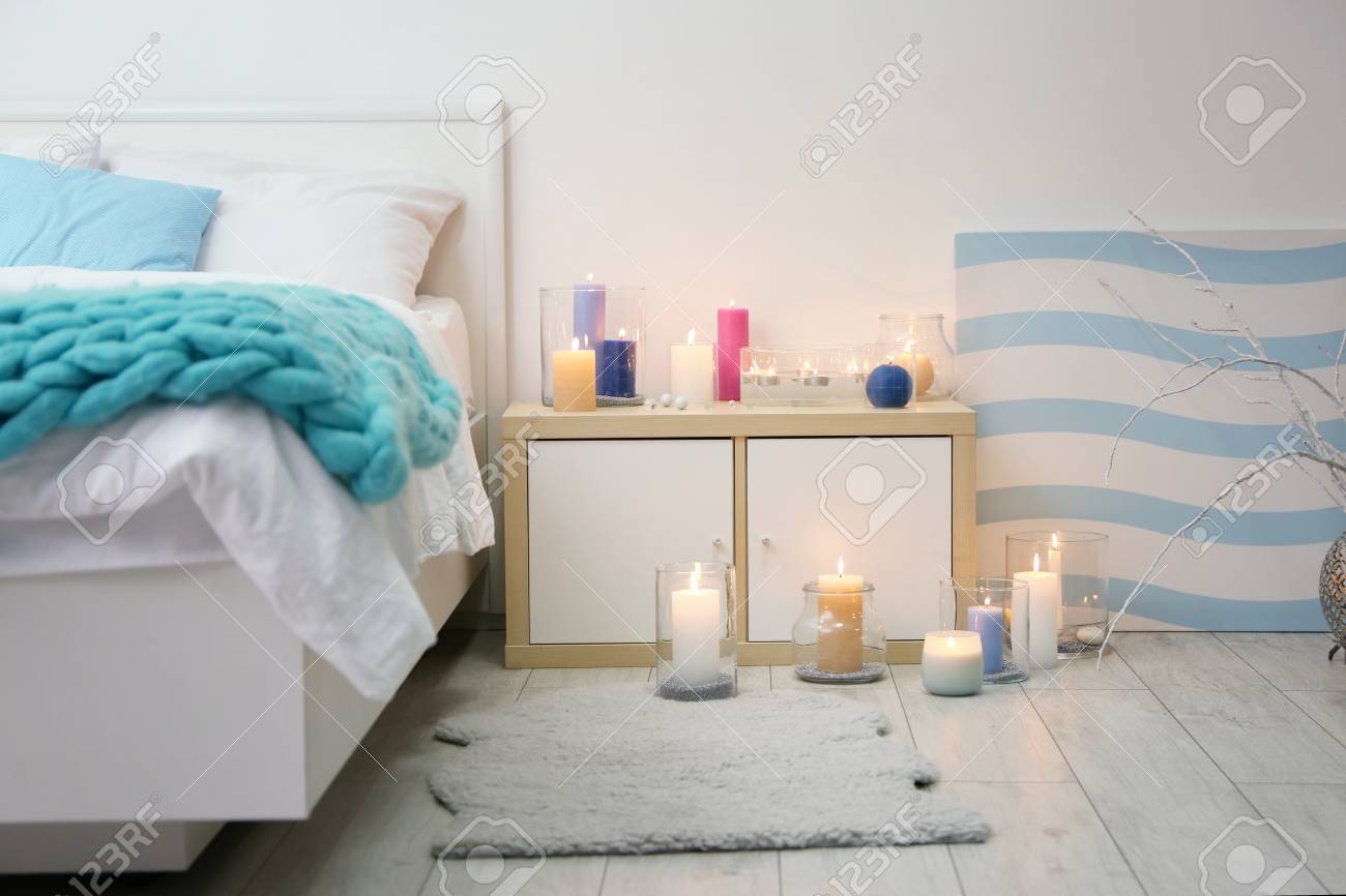 Cozy Bedroom Decorated With Burning Candles