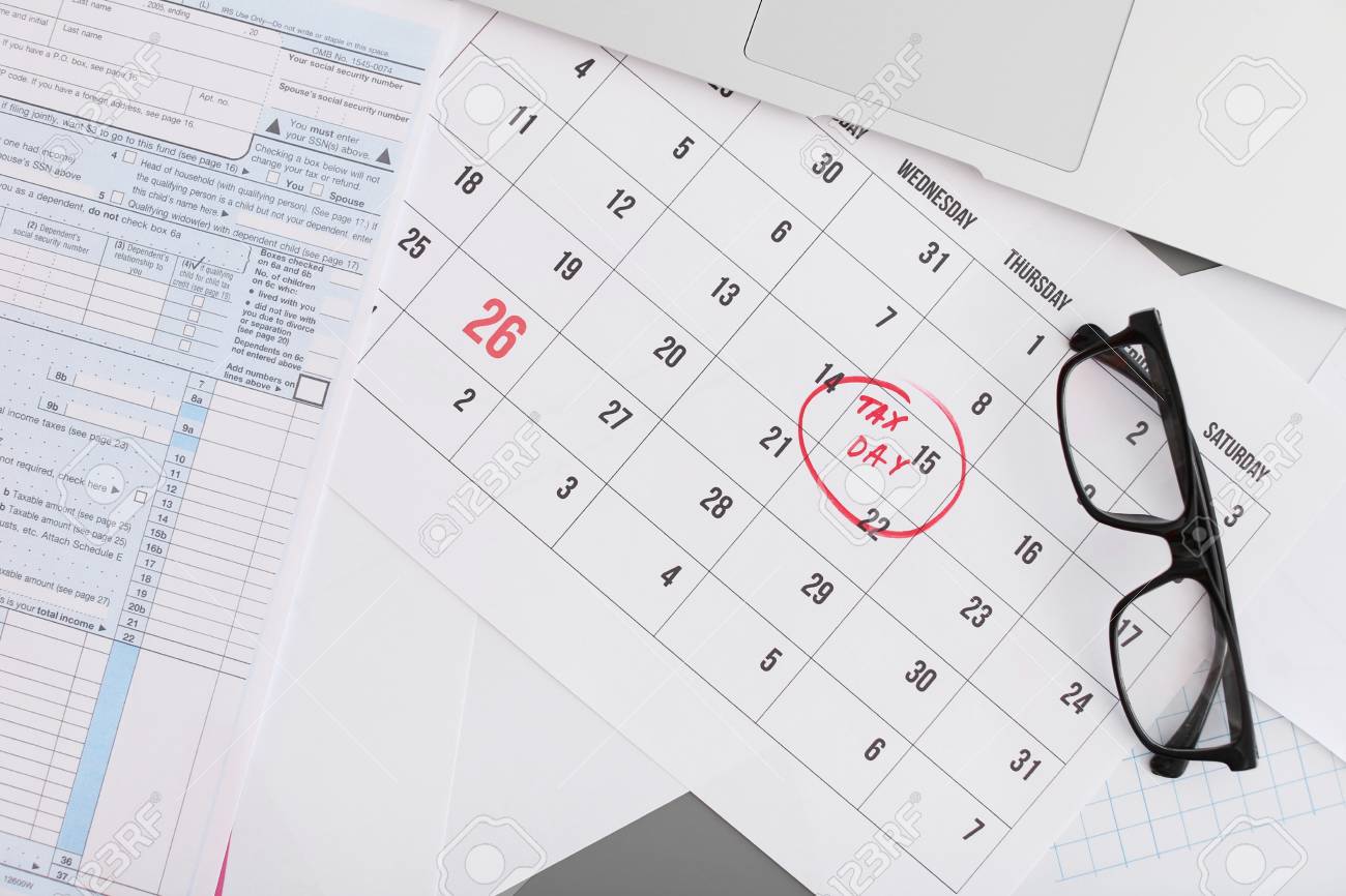 flat lay composition with calendar documents and glasses on stock calendar documents