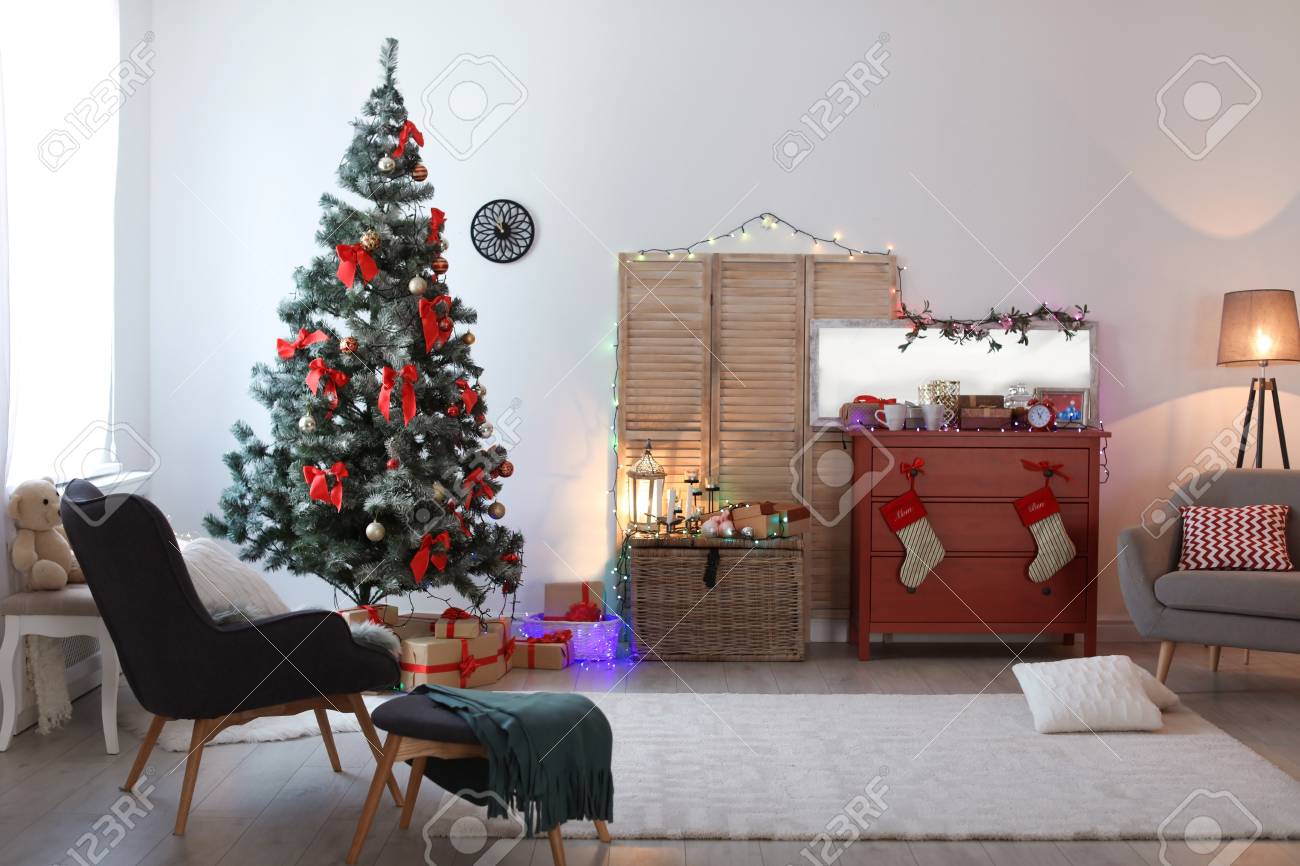 Stylish living room interior with decorated Christmas tree - 106347907 Stylish living room interior with decorated Christmas tree - 106347907