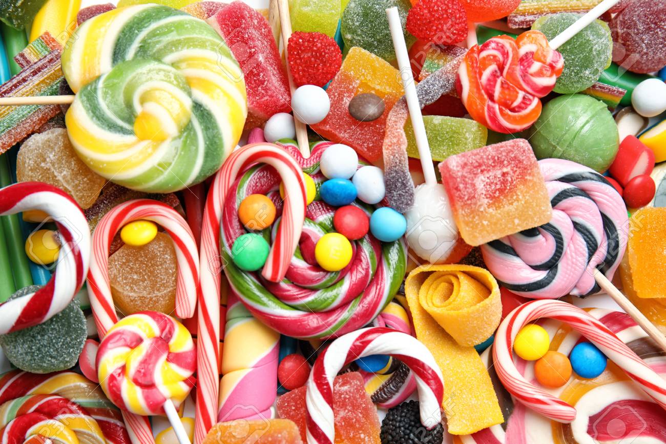 Many Different Yummy Candies As 