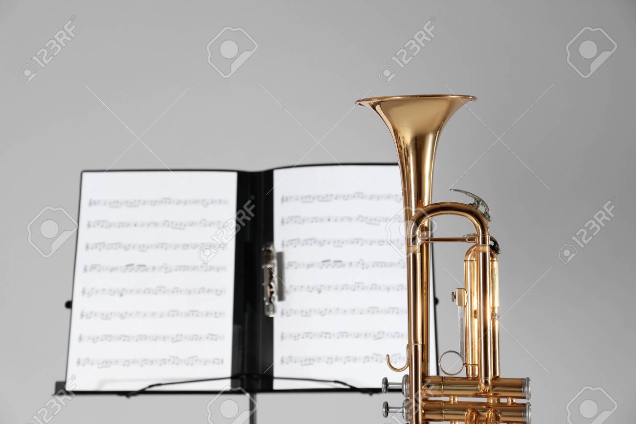 background Trumpet grey sheets stand and with music on note