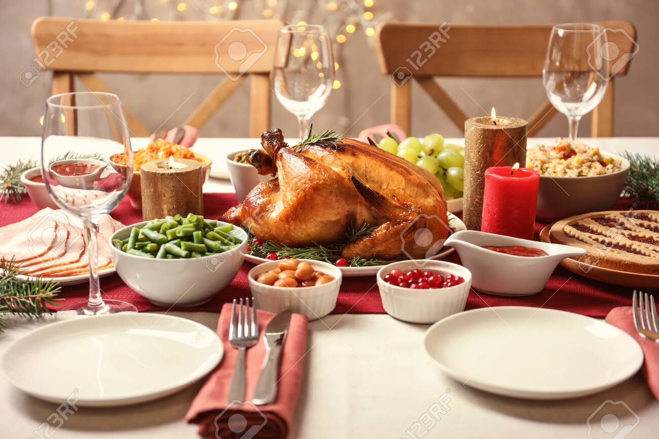 124147316-traditional-festive-dinner-with-delicious-roasted-turkey-served-on-table.jpg