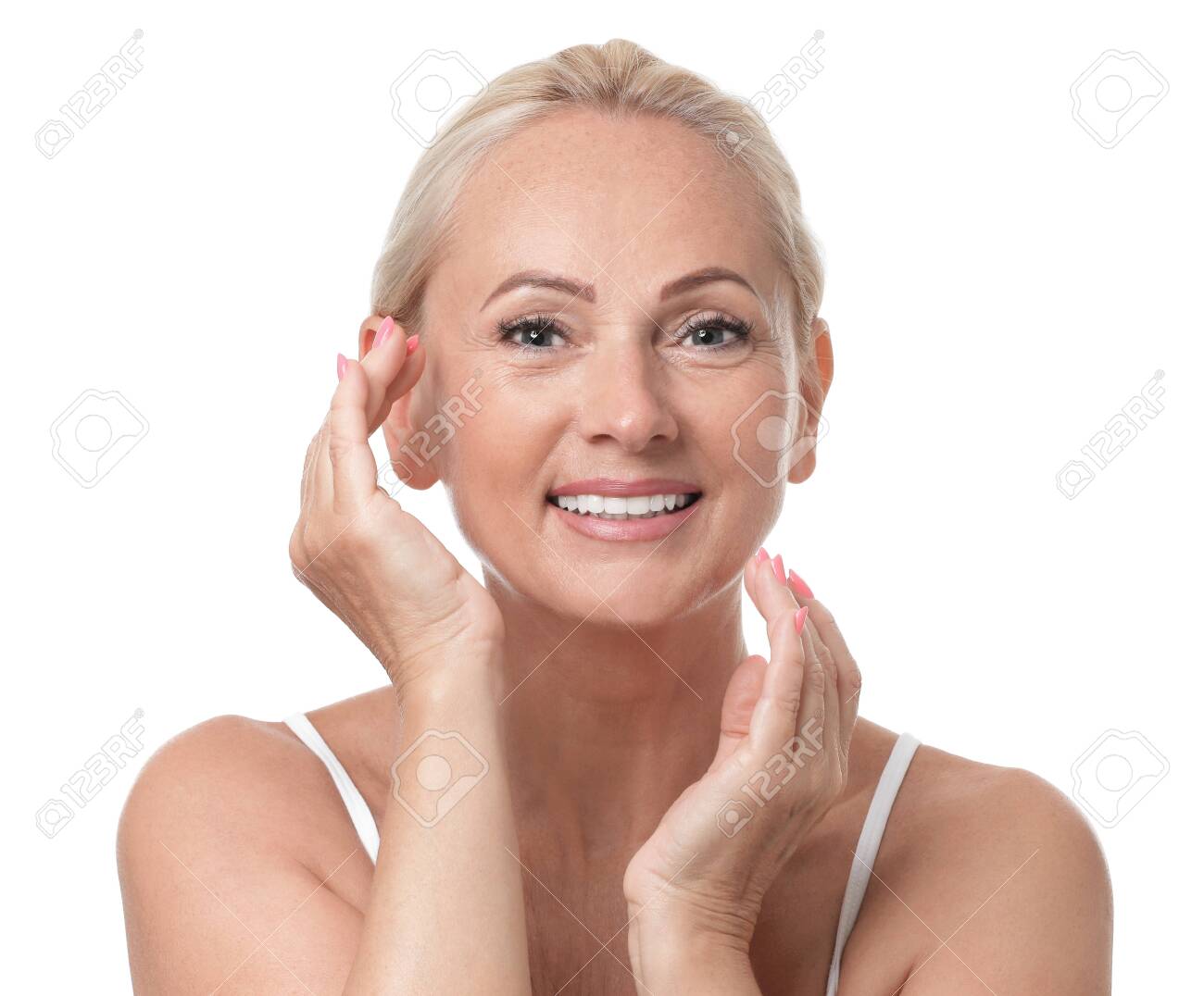 Portrait of beautiful mature woman with perfect skin on white background - 128885590 Portrait of beautiful mature woman with perfect skin on white background - 128885590