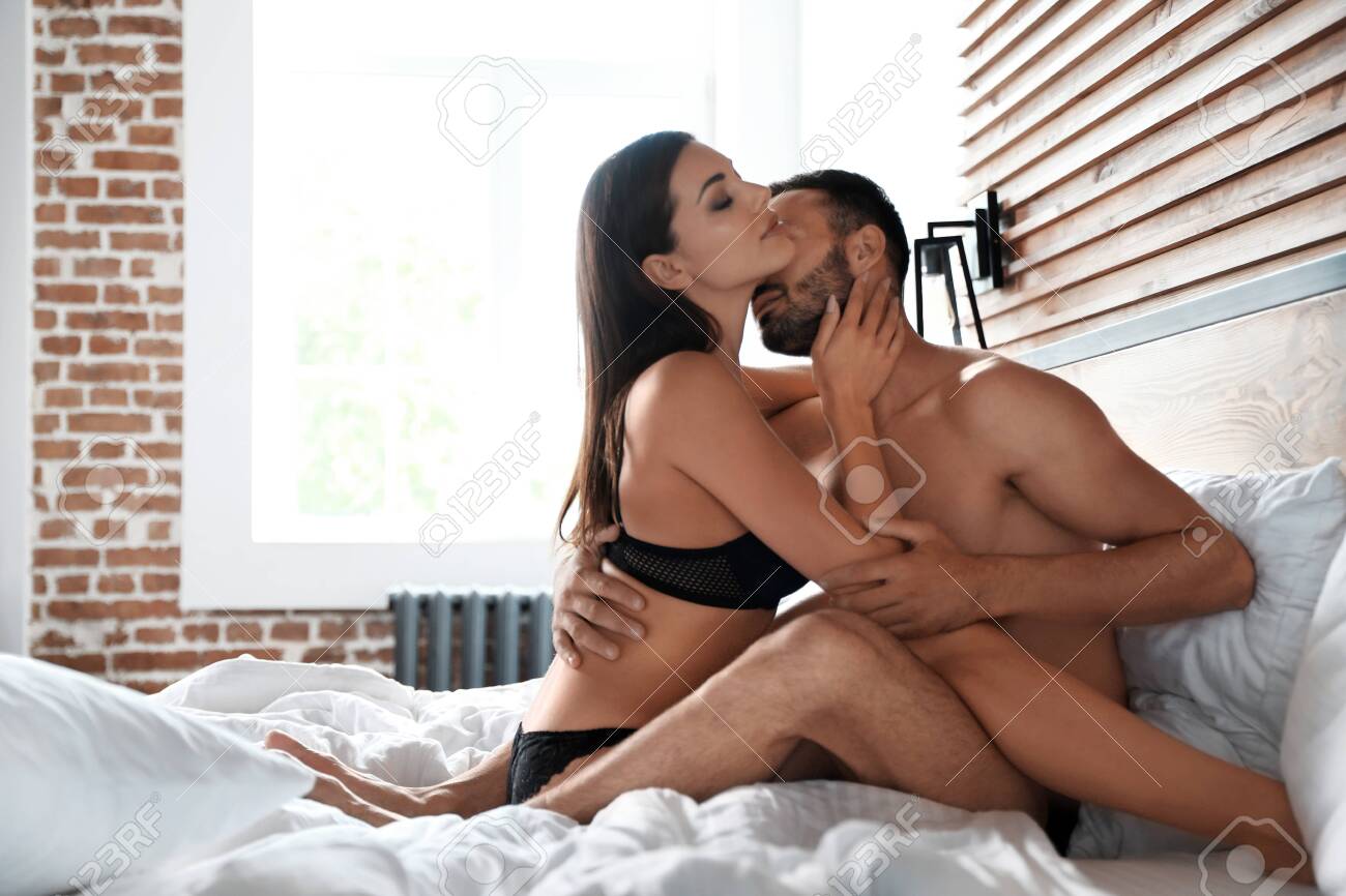 Passionate Young Couple Having Sex In