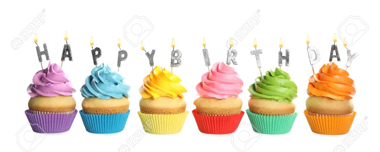 Birthday cupcakes with candles on white background - 143325200 Birthday cupcakes with candles on white background - 143325200