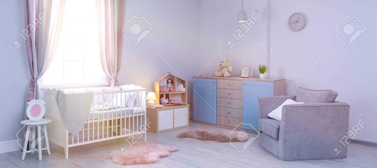 baby crib next to window