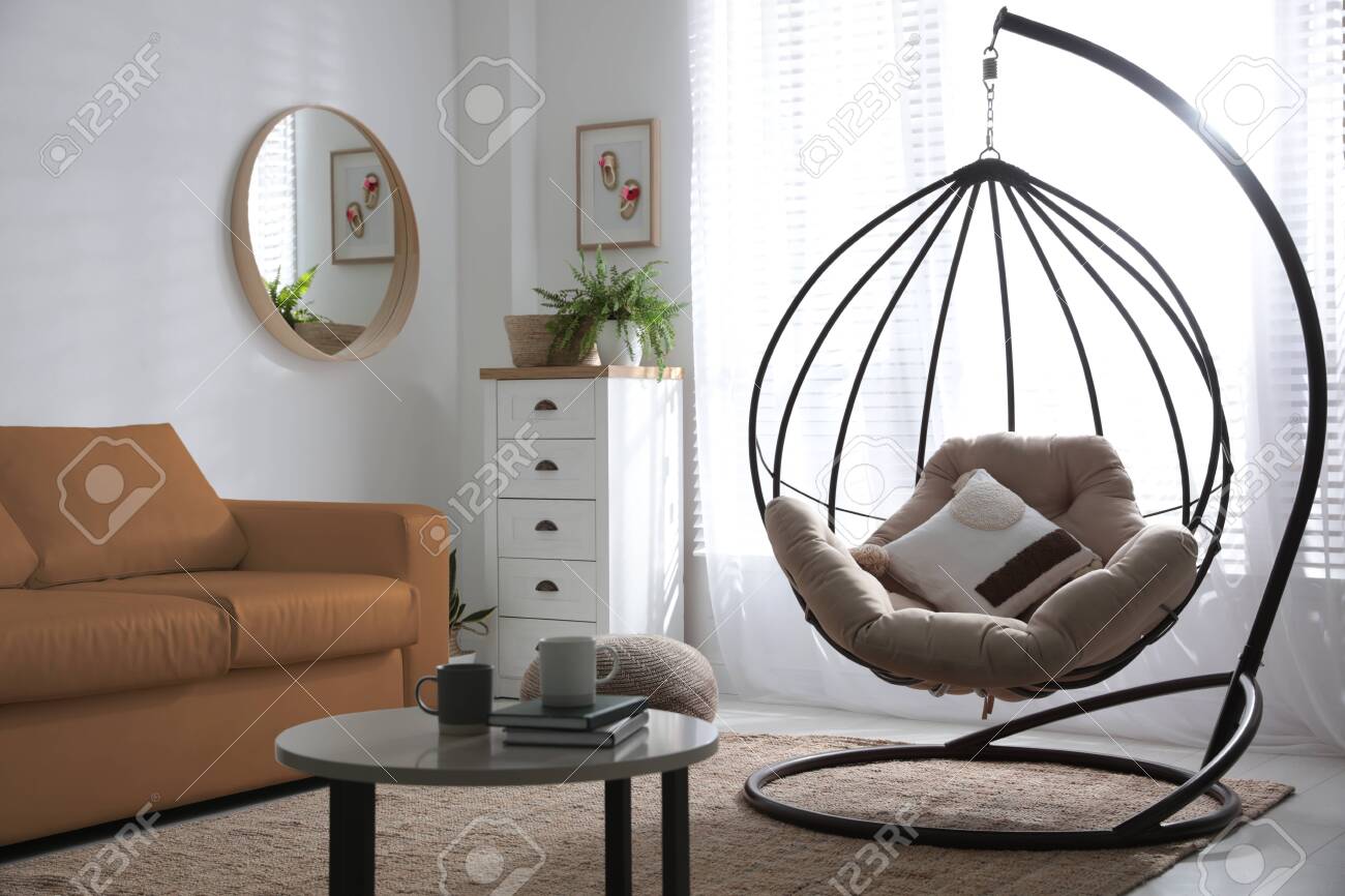 Stylish Leather Sofa And Swing Chair In Modern Living Room Interior Stock Photo Picture And Royalty Free Image Image 150250476