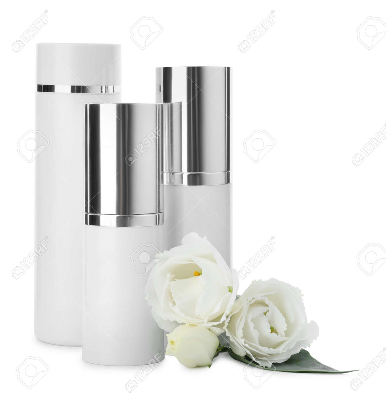 Different cosmetic products and fresh flowers on white background - 165360634 Different cosmetic products and fresh flowers on white background - 165360634