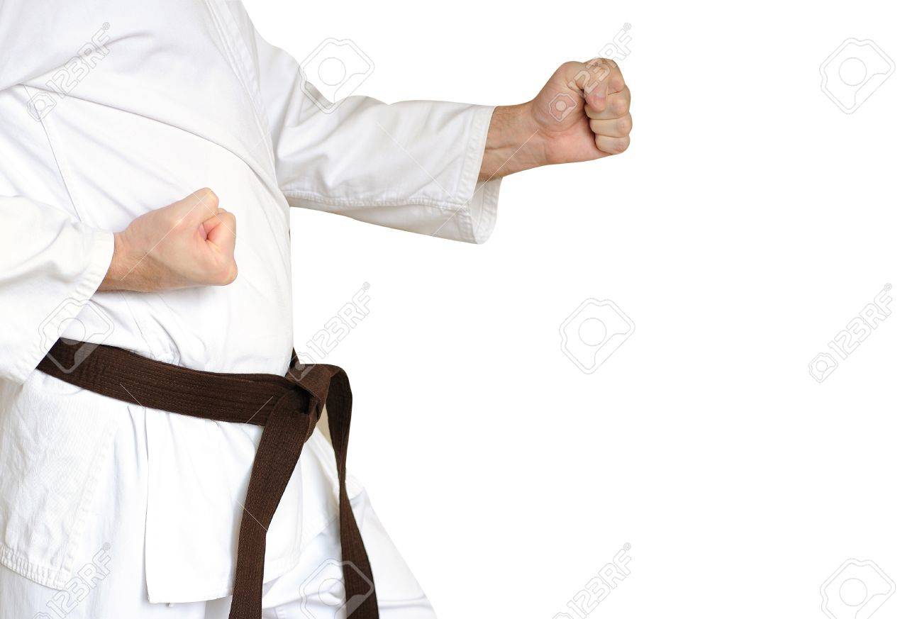 Man in a kimono and belt for martial arts on the white background - 17167530 Man in a kimono and belt for martial arts on the white background - 17167530