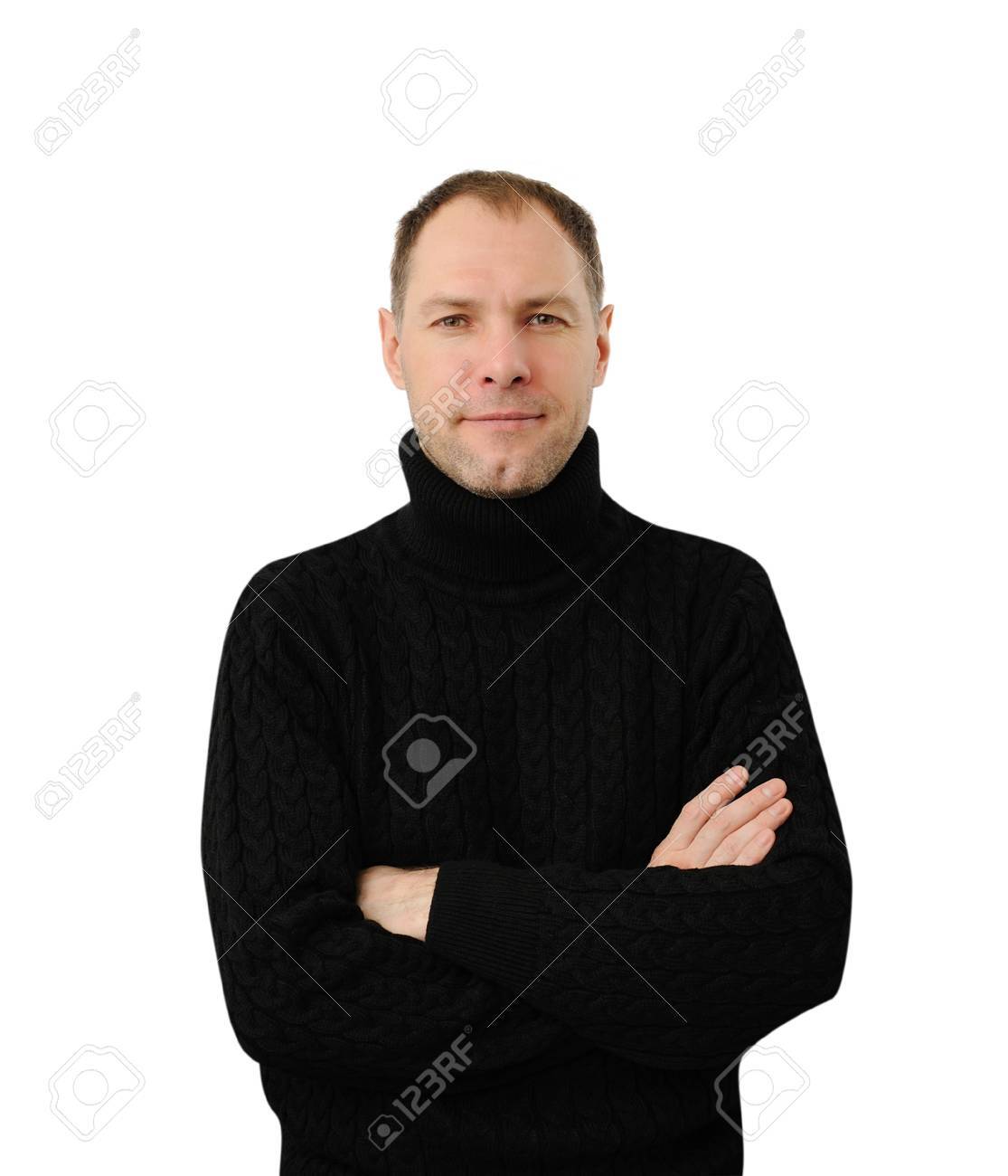 Sly smiling man in black isolated on the white background - 17337012 Sly smiling man in black isolated on the white background - 17337012