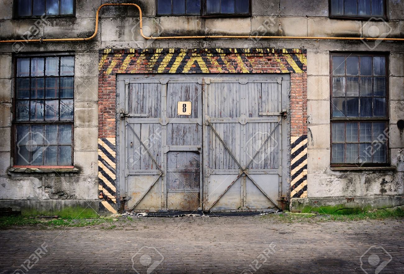 Abandoned old factory with closed door and windows - 17932823 Abandoned old factory with closed door and windows - 17932823