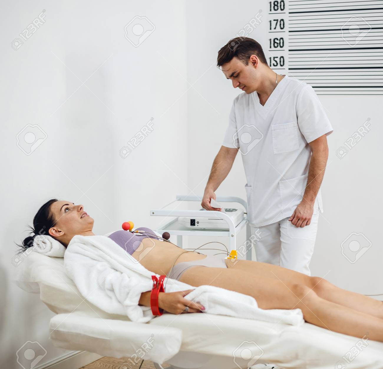 Male Doctor With Electrocardiogram Equipment Making Cardiogram Stock Photo Picture And Royalty Free Image Image