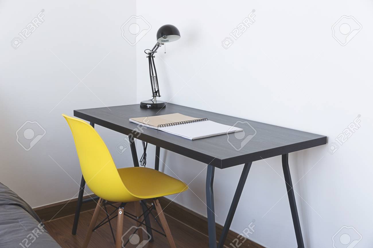 Work Table With Book, Lamp And Yellow 