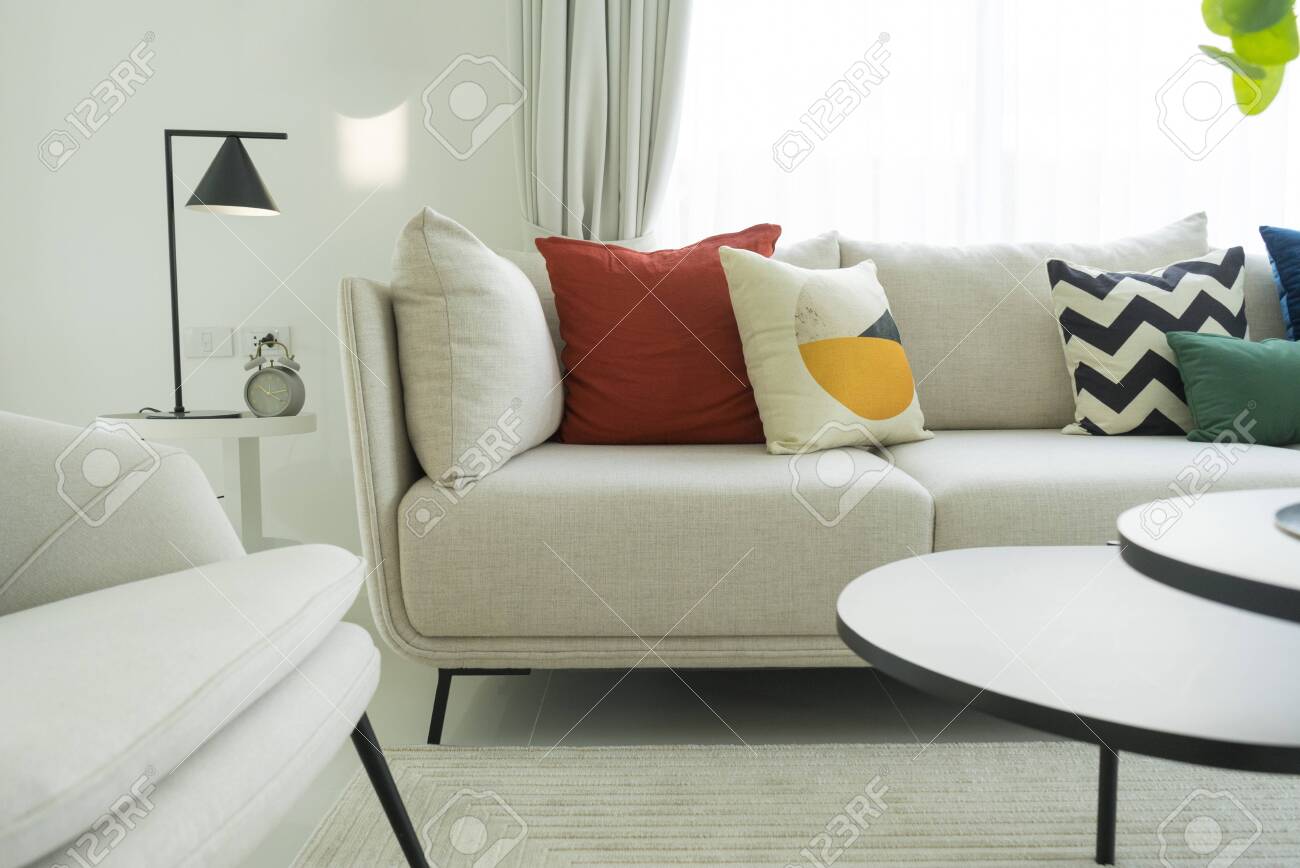 white sofa with pillows