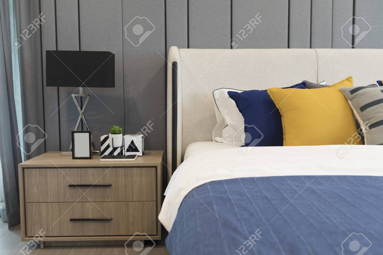 Yellow And Blue Graphic Print Pillow Setting With Table Lamp Stock Photo Picture And Royalty Free Image Image 154065870
