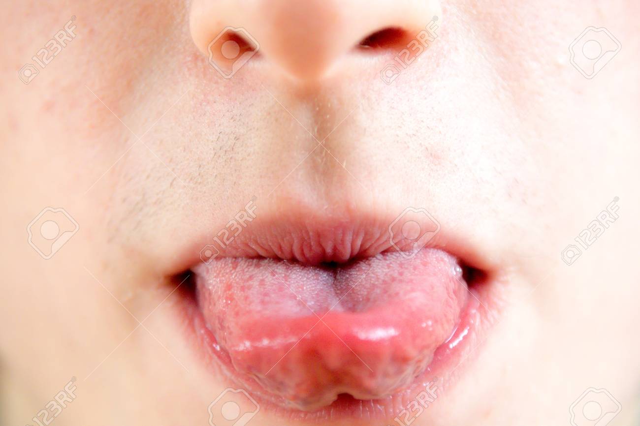 Close Up Of A Teenage Boy Sticking Out His Tounge Stock Photo 95912096 Close Up Of A Teenage Boy Sticking Out His Tounge Stock Photo 95912096