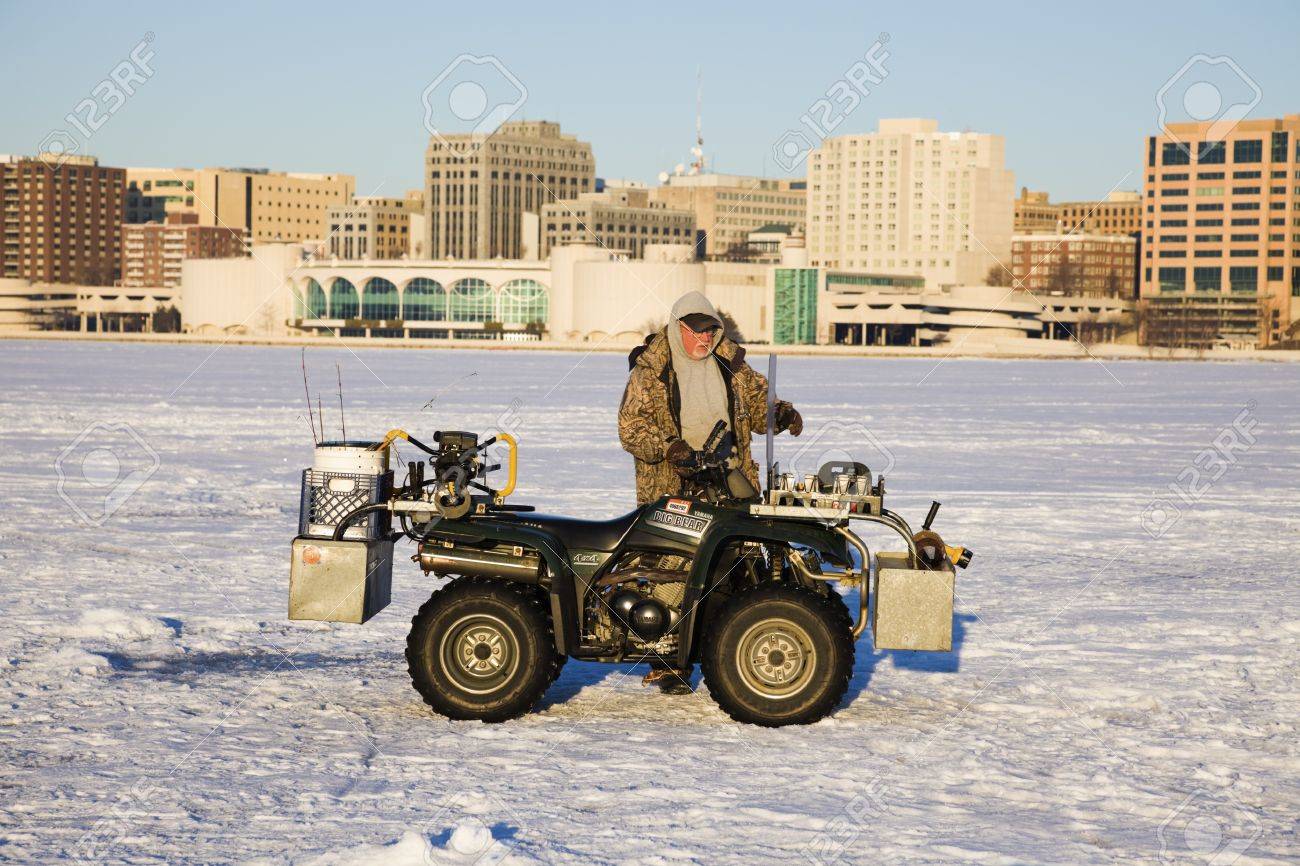 Saturday Morning Snow In Madison >> Fisherman With His Quad On The Frozen Lake Monona In Madison Saturday Morning Snow In Madison >> Fisherman With His Quad On The Frozen Lake Monona In Madison