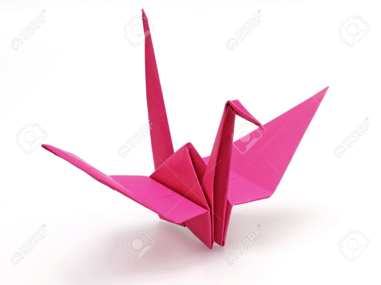 pink origami bird on