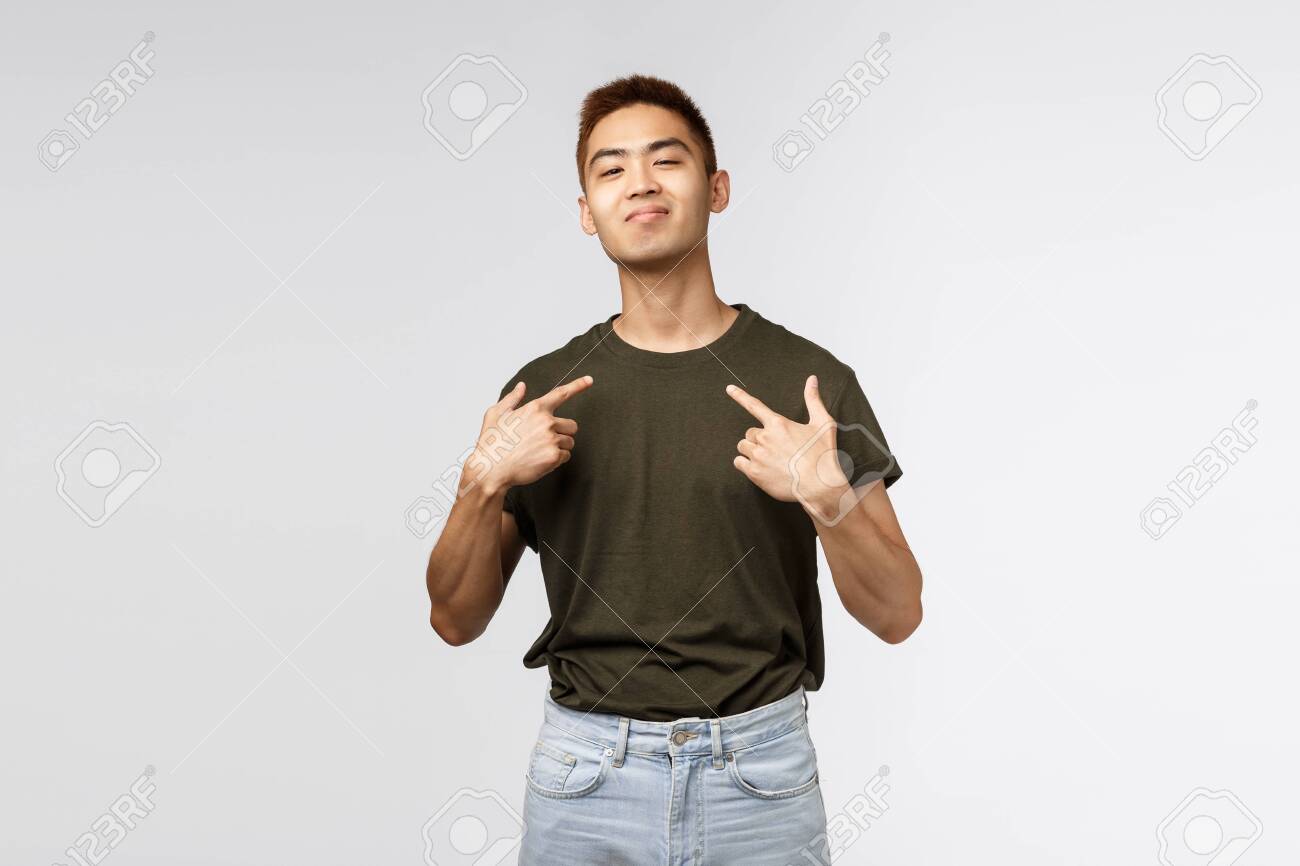 Portrait Of Proud And Boastful Young Asian Macho Man Show Off Stock Photo Picture And Royalty Free Image Image