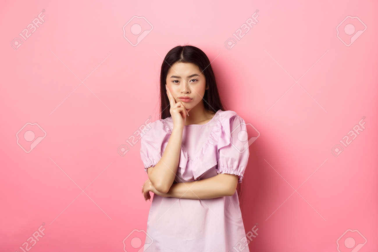 Bored Asian Teen Girl Look Indifferent